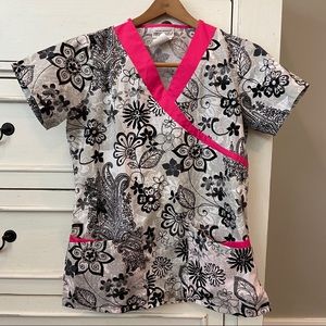 UA Scrubs Black, White, and Pink Floral Scrub Top.